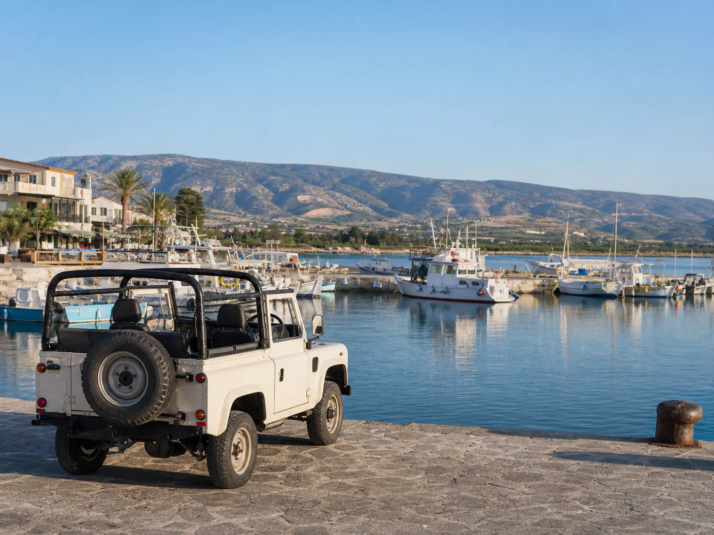 Open-top jeep at Latchi Harbour